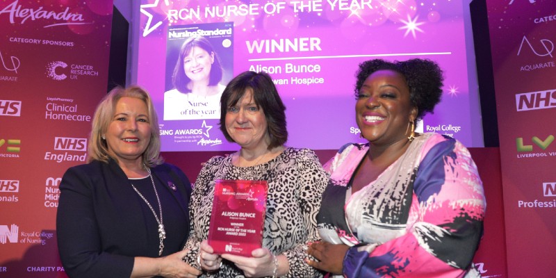 RCN Nurse of the Year 2022 Alison Bunce (centre), with RCN General Secretary Pat ​Cullen (left) and comedian Judi Love, who hosted the awards ceremony 