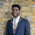 Smiling photo of RCN President, Bejoy Sebastian