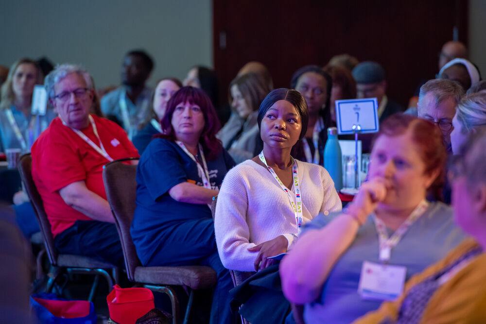 Delegates watching the presentations at a Joint Reps conference