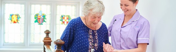 NSW helping elderly lady up stairs