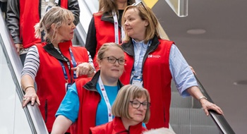 Ambassadors going down escalator at Congress