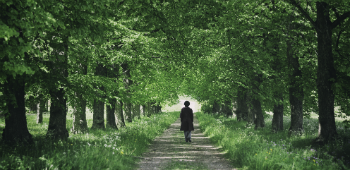 Woman walking in woods