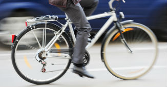 Person riding bicycle on the road
