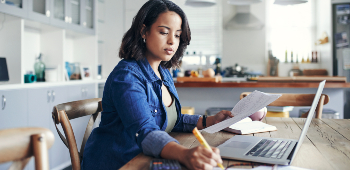 woman on laptop in cafe
