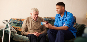 Community nurse with older patient Community nurse with older patient