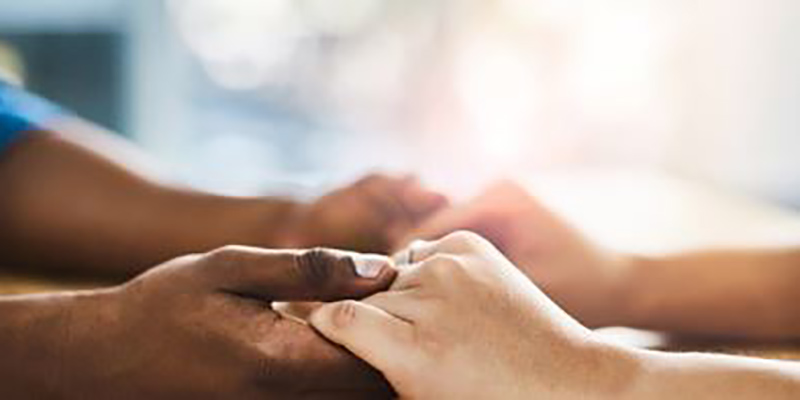 Hands holding each other Hands holding each other