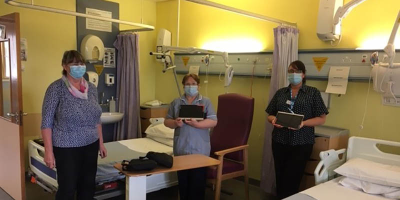 Janet Mortimer accepting iPads from Northgate United Reform Church Darlington for patients to Facetime with relatives - 19 June 2020