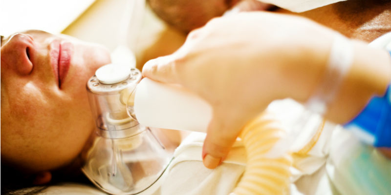 Woman in labour with nitrous oxide