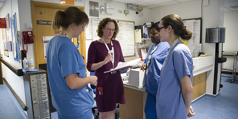 Nurses talking in a group