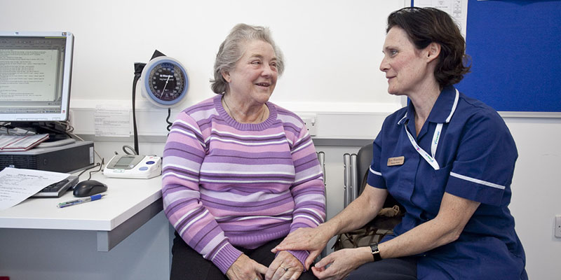 Practice Nurse with older patient