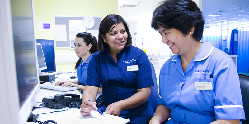 Two nurses doing paperwork