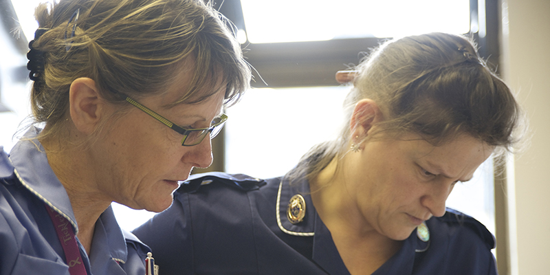 Two nurses looking concerned