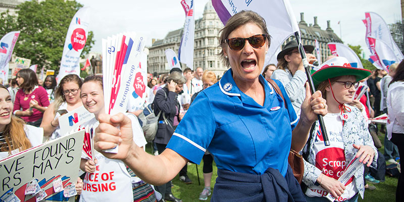 Crowd scene at scrap the cap rally