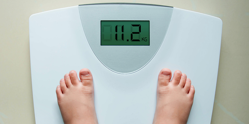 Child on weighing scales