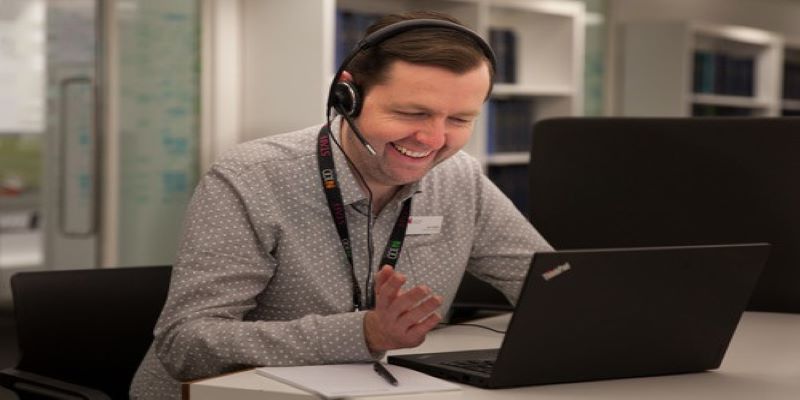 Alan from the library team in front of a laptop