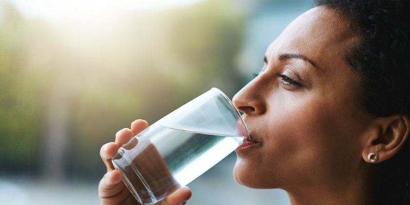 Woman drinking a glass of water