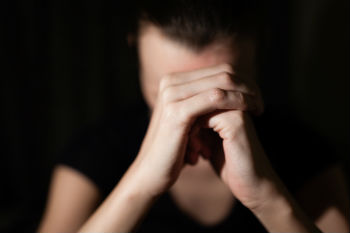 Man with head in hands