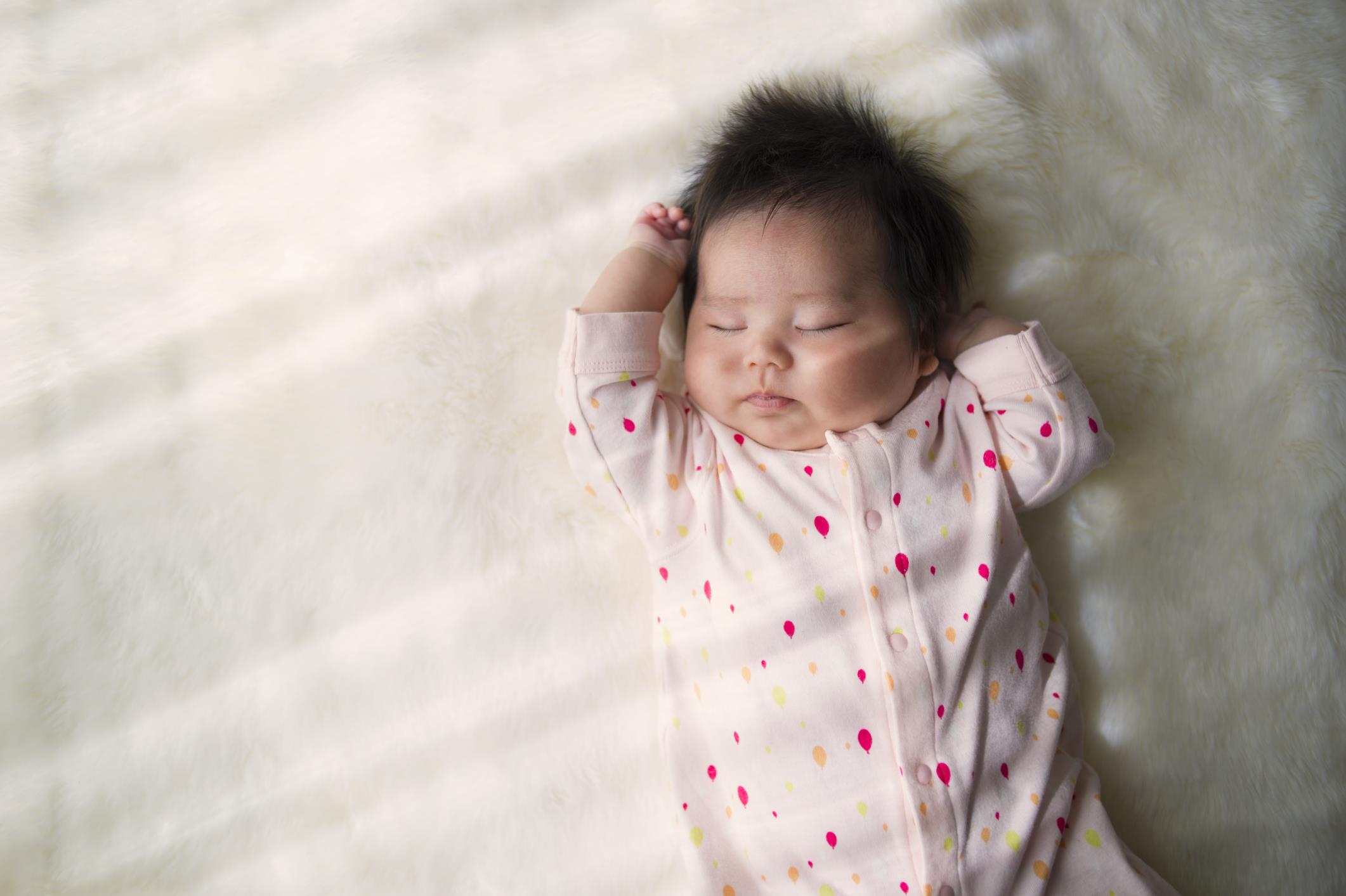 baby in bed sleeping