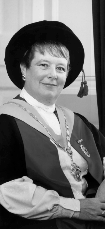 June Clark, 1990–1994. After qualifying, June worked as a health visitor and remained in community nursing as a manager, professor, and political advocate for nearly 40 years. Involved in nursing at an international level, June helped develop nursing leadership in Kazakhstan and Romania. In 1995 she was awarded a DBE for her services to nursing. @Model.StoryImage.Alt