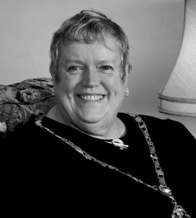 Maude Storey, 1986–1990. Following her training, Maude returned to Wigan as a domiciliary midwife in 1953. She became a theatre sister, then a Clinical Instructor at Wigan Infirmary (1959-1968) and a member of the Wigan Health Authority, where she was later appointed Regional Nursing Officer. As a tutor, she was involved with the first graduate course for nurses at Manchester University. @Model.StoryImage.Alt