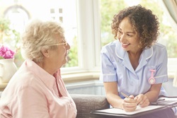 Nurse talking to a patient