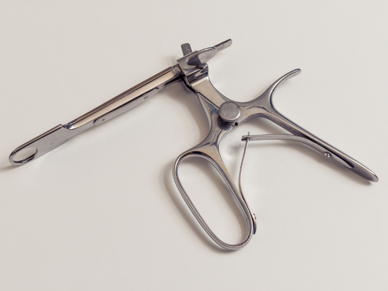 photo of a metal tonsil guillotine