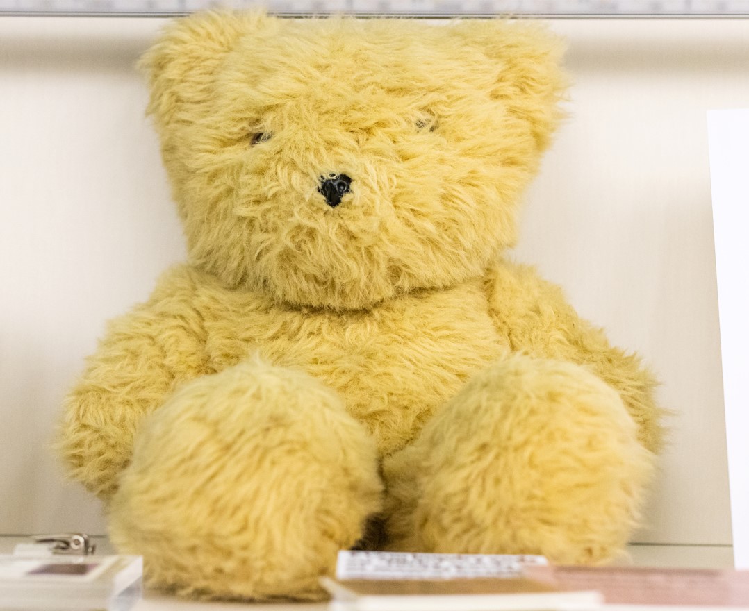 A beige stuffed teddy bear