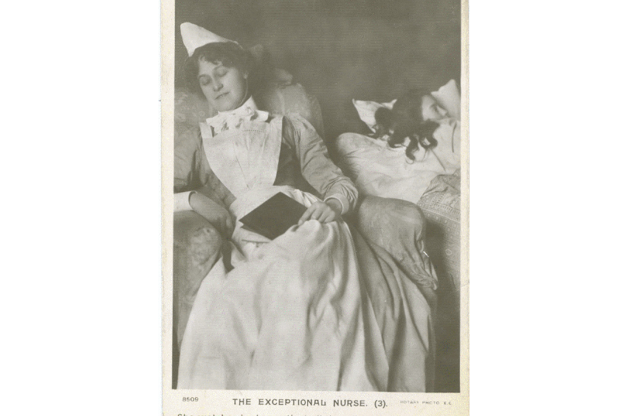 Postcard of a posed photograph of a sleeping nurse in an armchair beside the bed of a patient, 1905. RCN Archive.