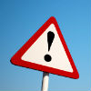 Road sign with an exclamation mark on it