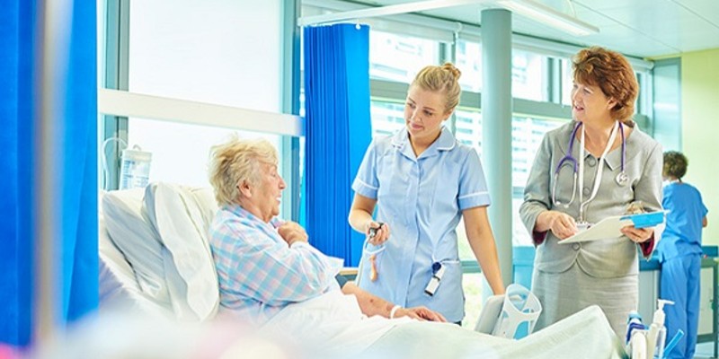 Nursing staff at patient's bedside