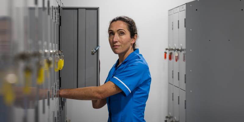 Nurse by locker