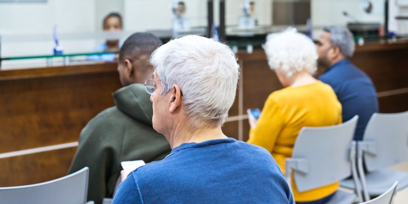 People sat in a waiting room