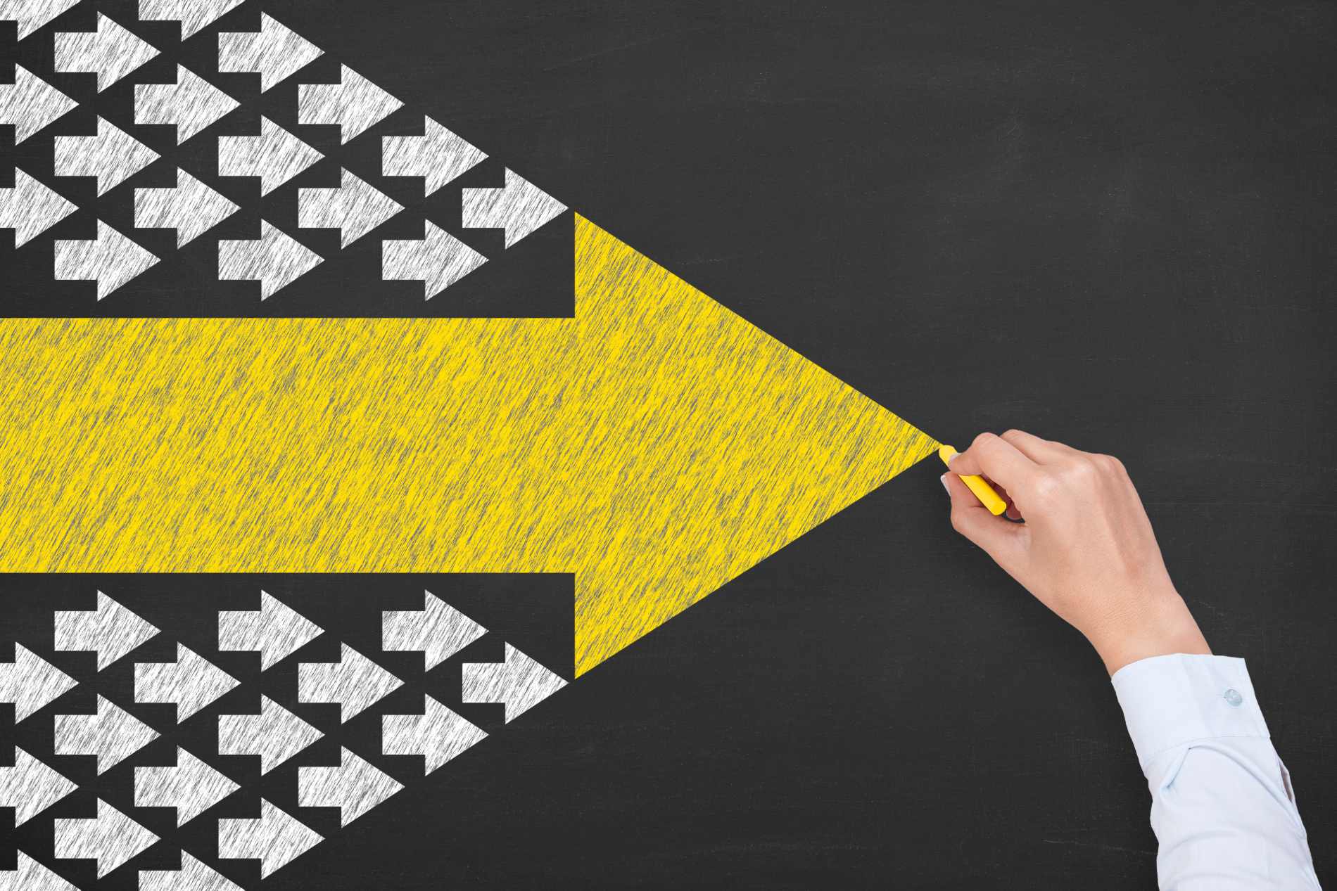 A yellow arrow drawn with chalk