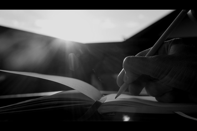 Person writing poetry