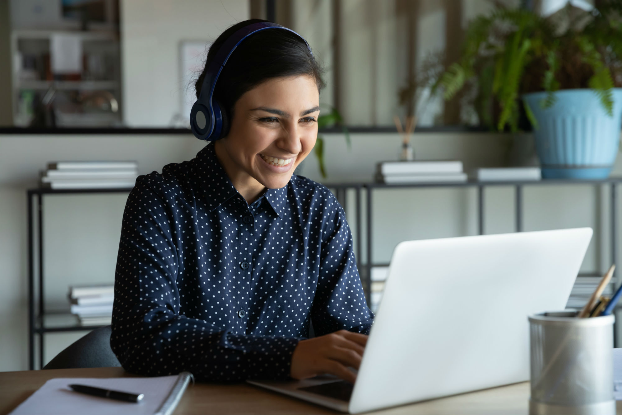 Woman looking at her laptop