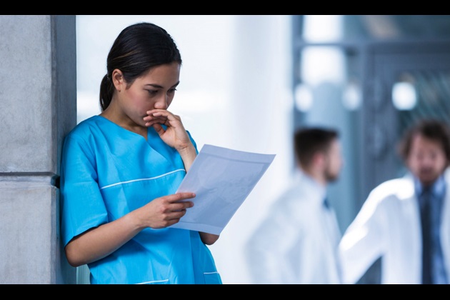Student nurse looking concerned