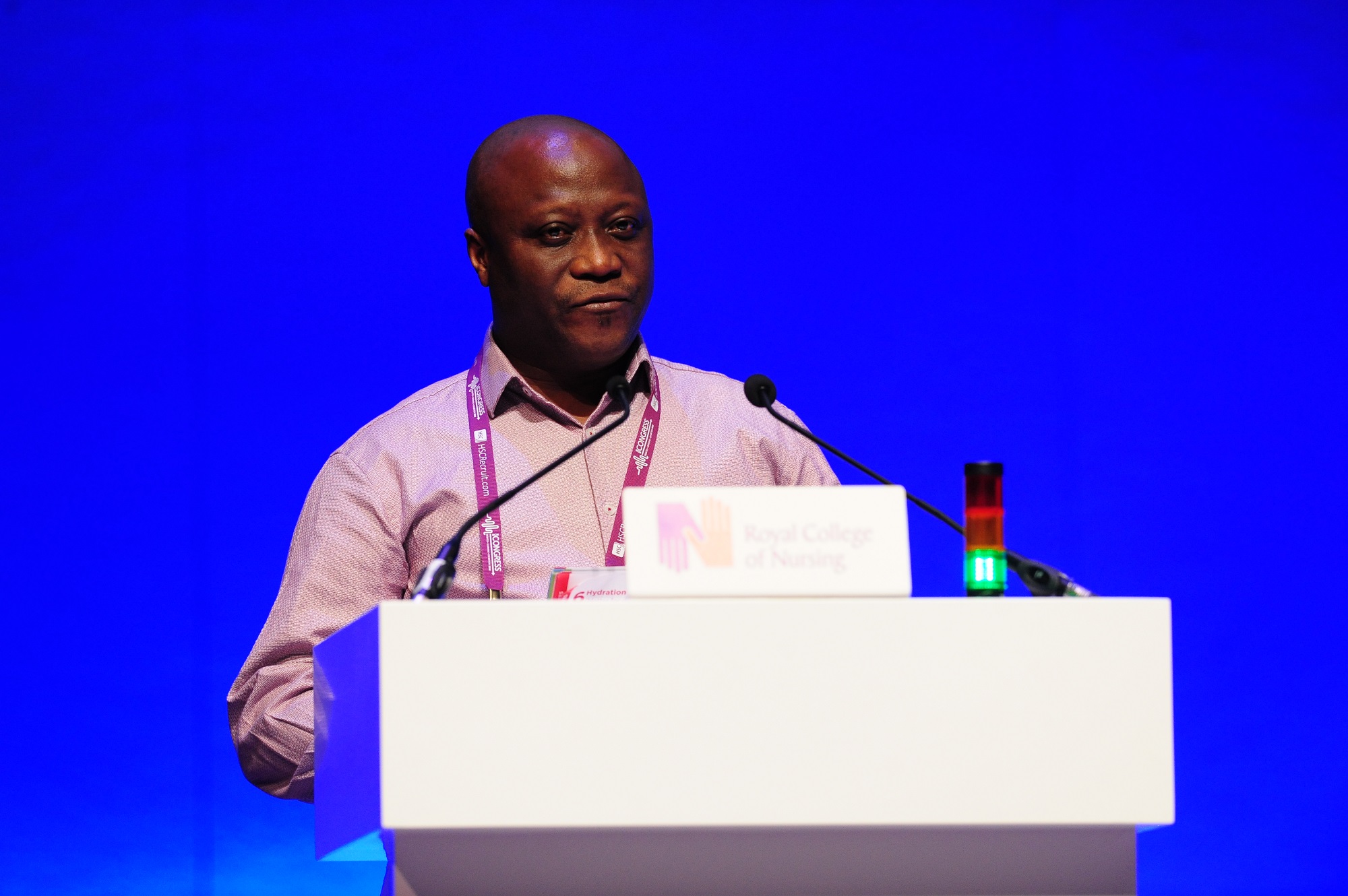 Monsuru Odekunle speaking at the podium