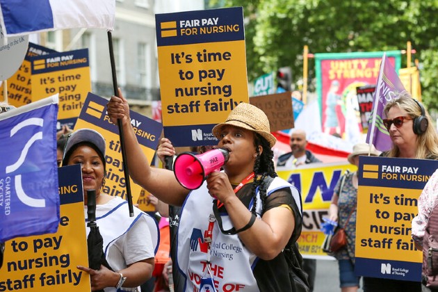 RCN members and supporters march for fair pay in June 2022 alongside other unions