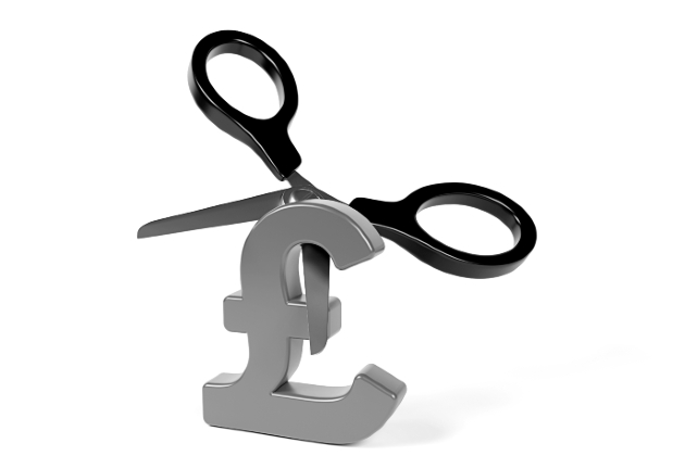 Pound symbol being cut with scissors