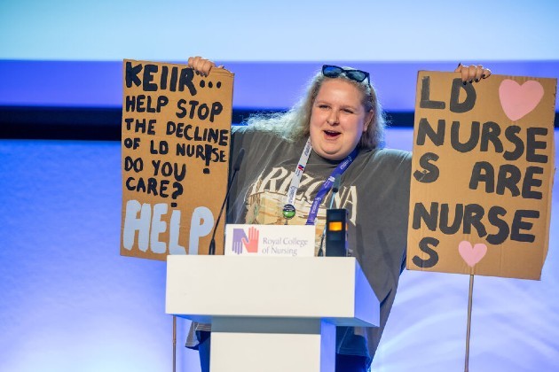 Student on stage at Congress