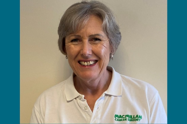 Photograph of Diane Rees, cancer care navigator, wearing white polo shirt with Macmillan Cancer logo