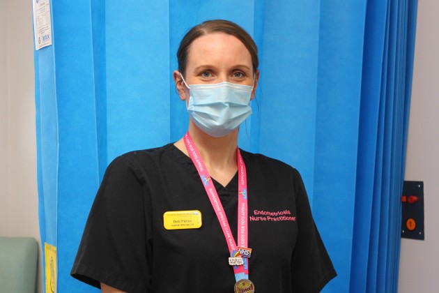 Deb Panes, endometriosis nurse practitioner, wearing mask inside the hospital she works at in Bristol