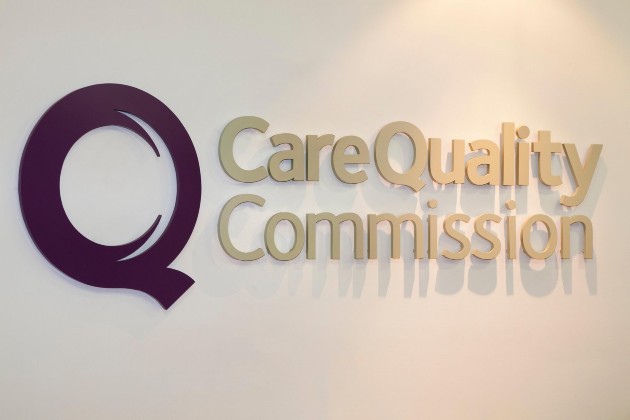 Care Quality Commission logo on a white wall
