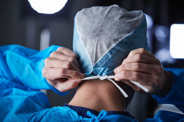 Nurse with PPE from back