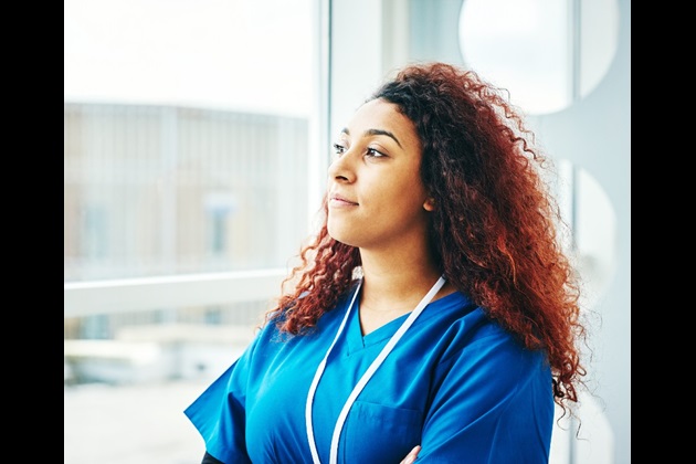Nurse looking out of the window