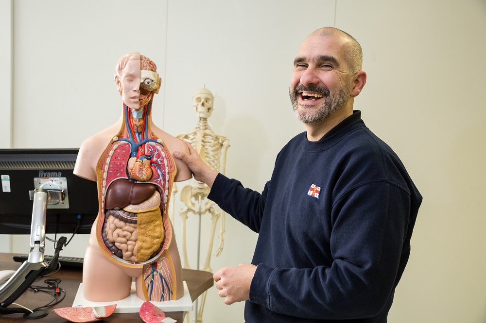 Iain at work with dummy