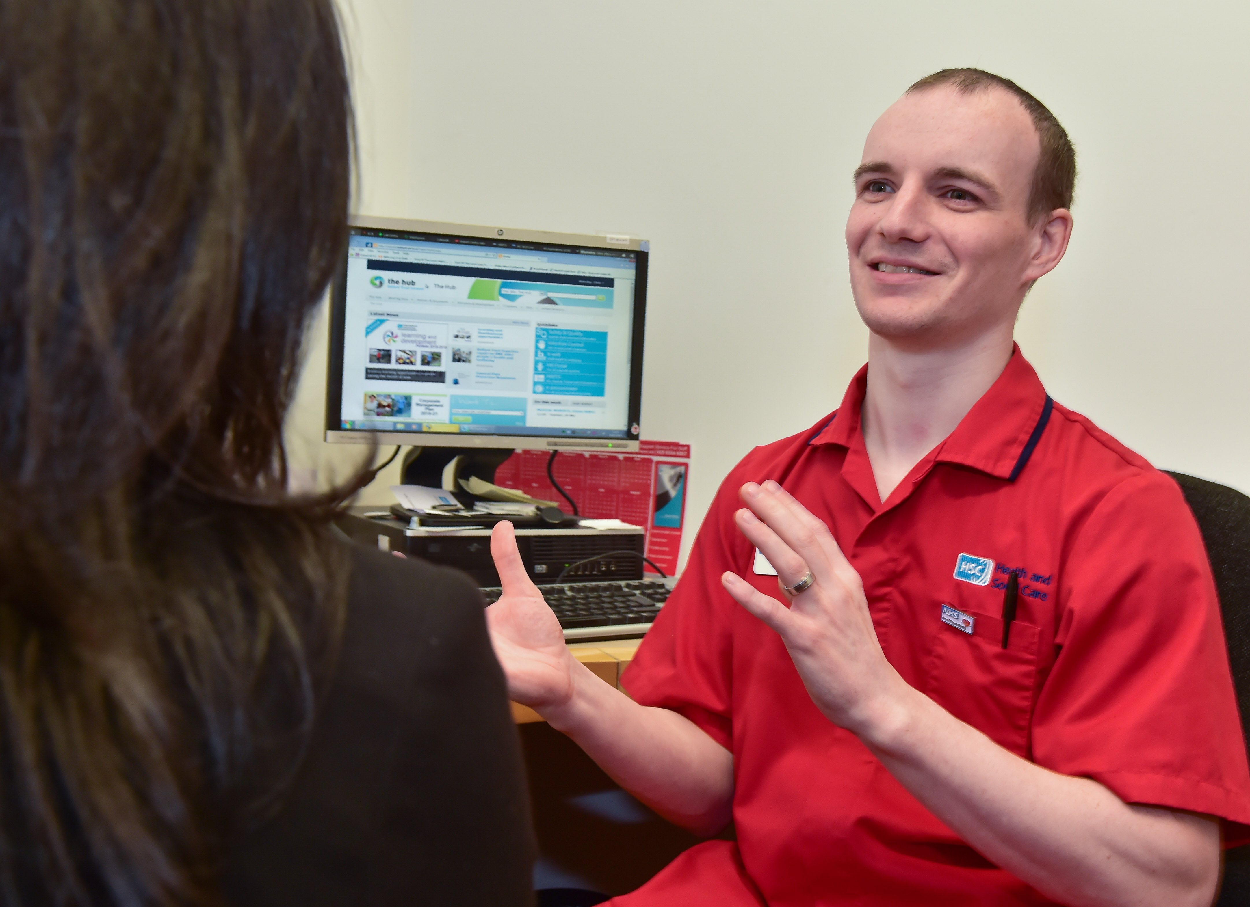 Chris talking to patient