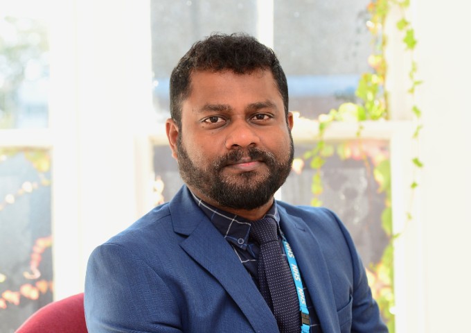 Portrait of Suresh Packiam, co-founder of the British Indian Nurses Association 