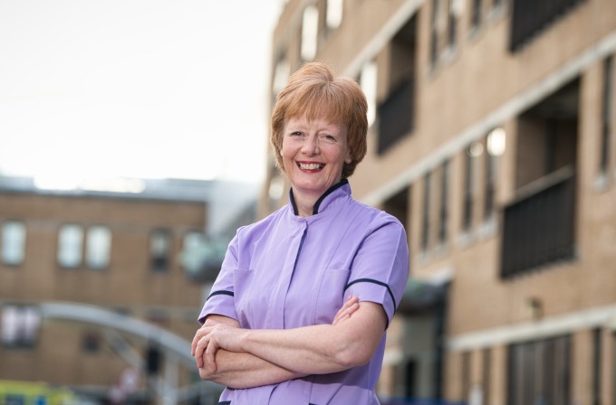 Research matron Aileen Burn stands outside the RVI Newcastle where she has been organising trials of a COVID-19 vaccine