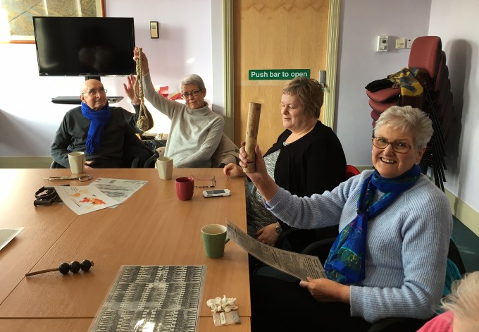 Group examine objects as part of cultural outreach session with Northumbria University and TWAM (Tyne and Wear Archives and Museums)